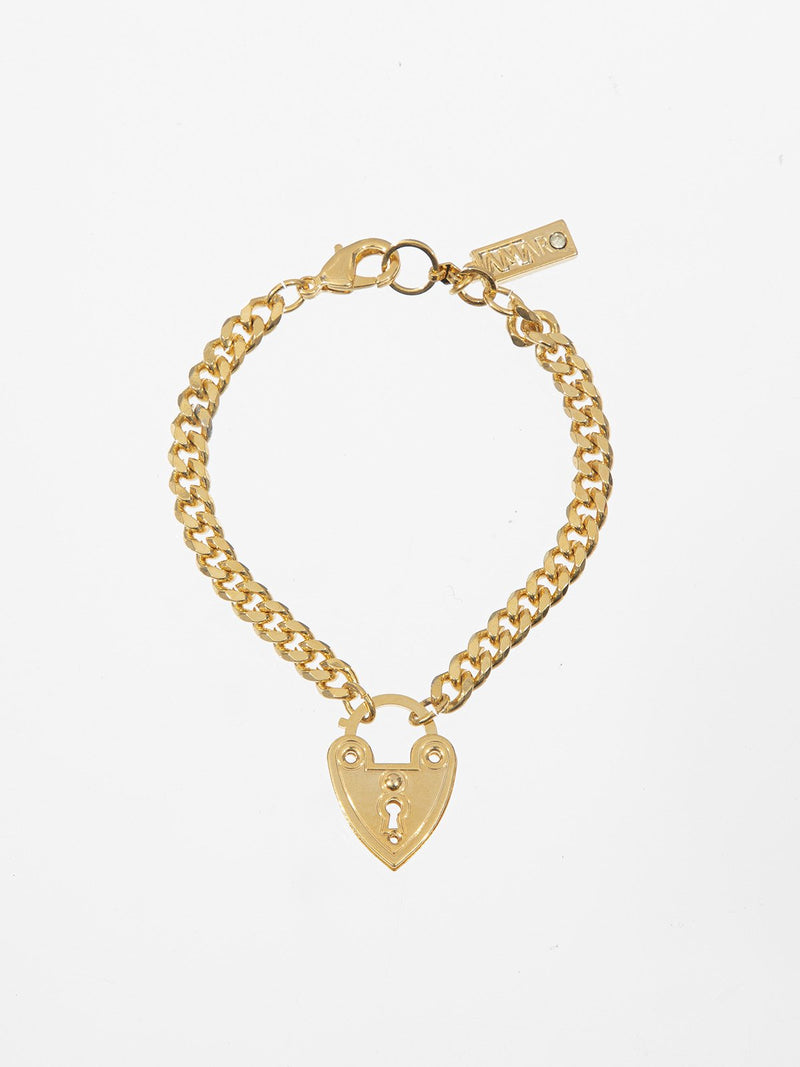 Heart lock bracelet- a rough gourmet bracelet with a hanging heart lock. The bracelet is plated with a high quality plating of 24K yellow gold.