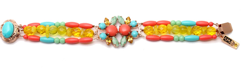 wide colorful braclet with a center stones element