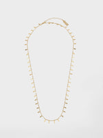 Nivi long chain - a delicate metal Leaves chain plated with a high-quality 24K yellow gold plating.