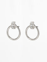 Jenny earrings – A round small post hoop earrings set with3 small pearls, Rhodium plated, in a classic fine look.