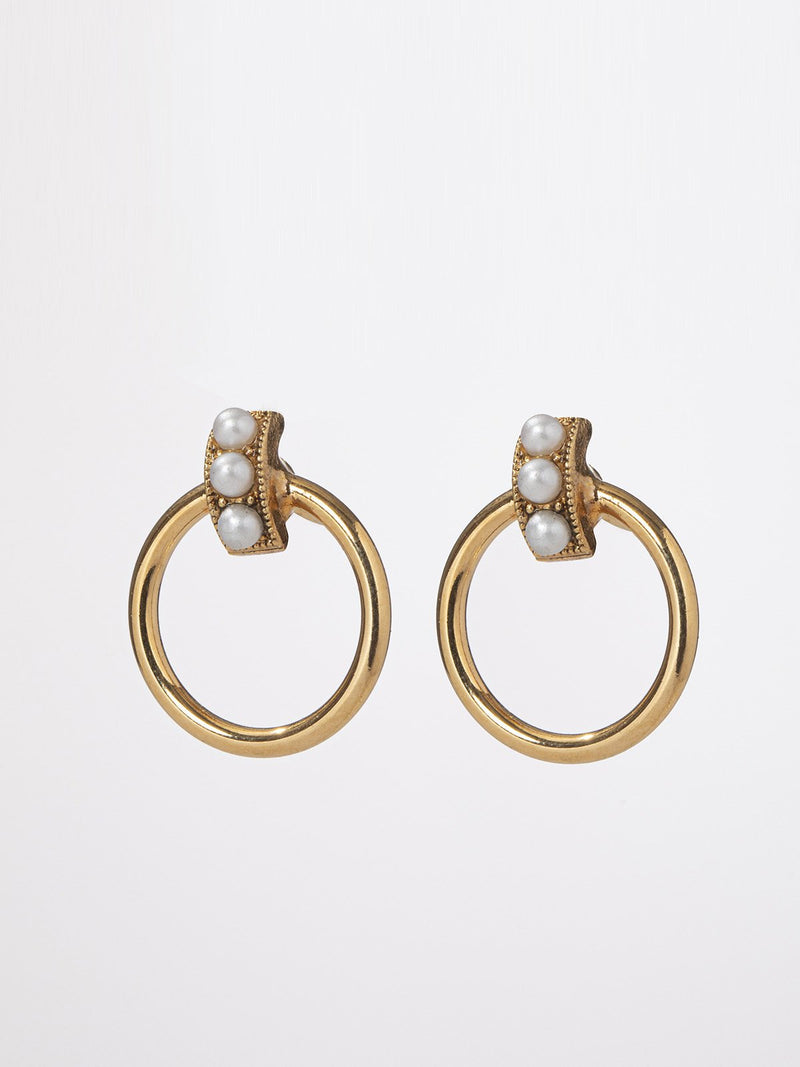 Jenny earrings – A round small post hoop earrings set with 3 small pearls, 24K yellow gold plated, in a classic fine look.