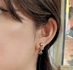 Small golden clip-on flower earrings